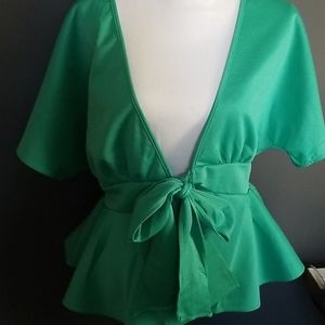 Deep V neck with bow in front.